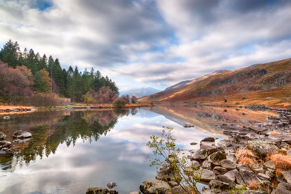 Reflections at Llynnau Mymbyr, Snowdonia - North Wales. Autumn colours surround this lake in Capel Curig and reflect in the still water of the lake, looking towards Snowdon Horseshoe. Smart Imaging & Framing Landscape Photography