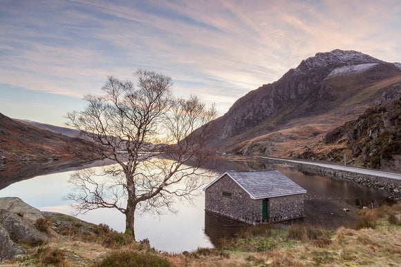 Just after the sunrise on this Winter's day at Llyn Ogwen in Snowdonia, North Wales. Very muted colours fill the cloudy sky and reflect in the lake below. Smart Imaging & Framing Landscape Photography