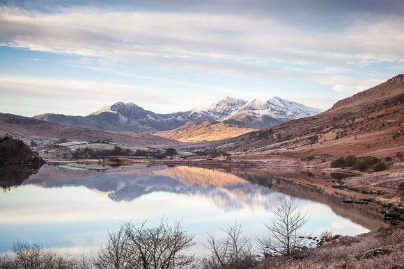 Snowdon Horseshoe, Winter Reflections - Snowdonia, North Wales. A calm, Winter's day with the still waters of Llyn Mymbyr at Capel Curig reflecting Snowdon Horseshoe in the distance. Smart Imaging & Framing Landscape Photography