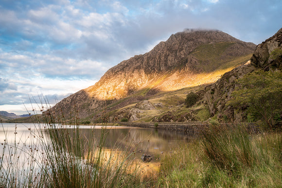 Tryfan Mountain in Snowdonia North Wales. Blue cloudy sky with Sun beam across mountain. Photography, Photo, Photograph, Smart Imaging