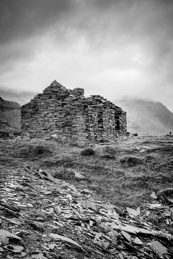 B&W The House that Slate Built - Dinorwic Quarry - A stormy day in Snowdonia National Park with the grey sky above imitating the slate colour below