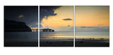 Canvas Wrap Triptych Wall Art - Calm Before the Storm - Colourful Orange Sunset reflects onto the sea with Stormy Clouds over Llandudno Pier, North Wales.